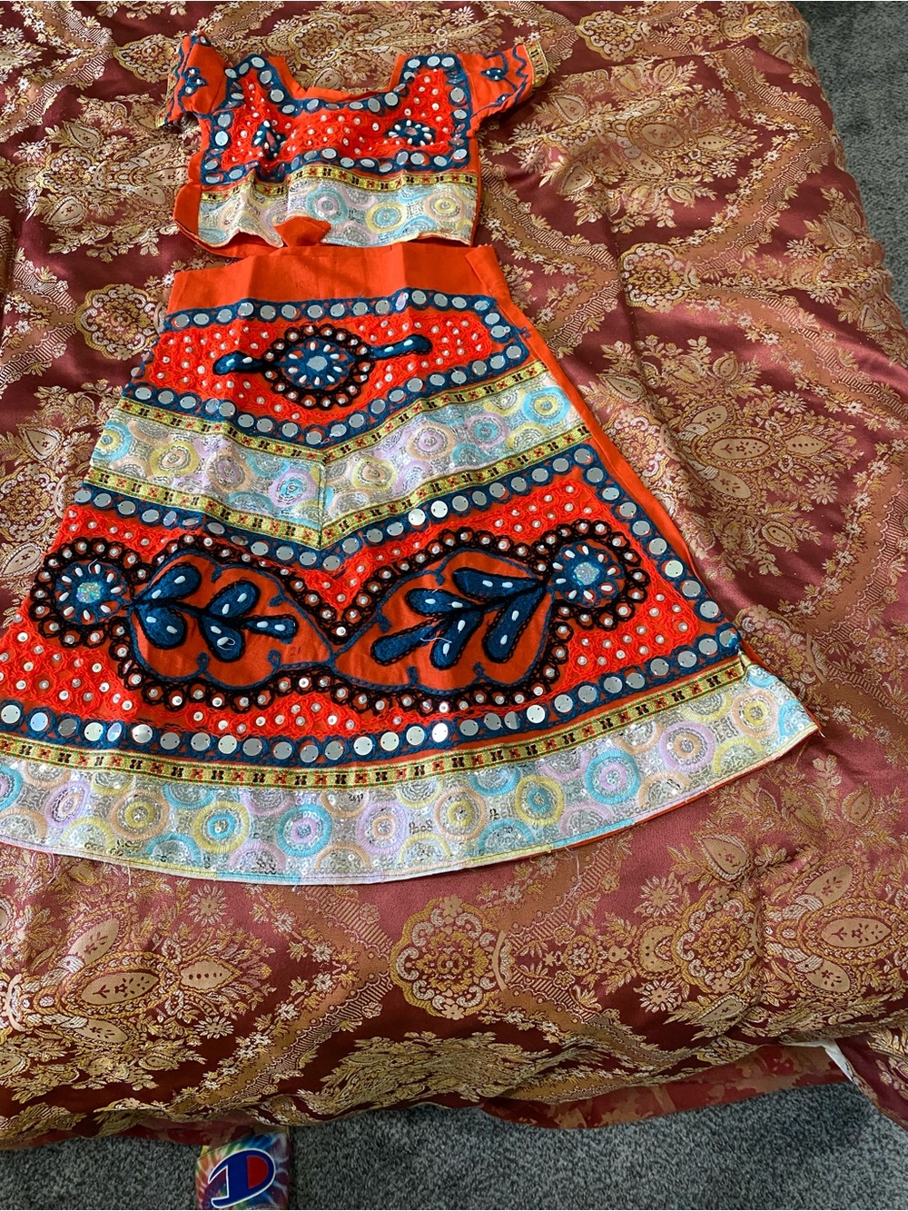 Embroidered Orange Two-Piece Skirt Set with Blue Accents